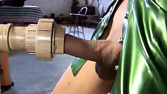 Big cock shemale strips her green latex dress and jerks off