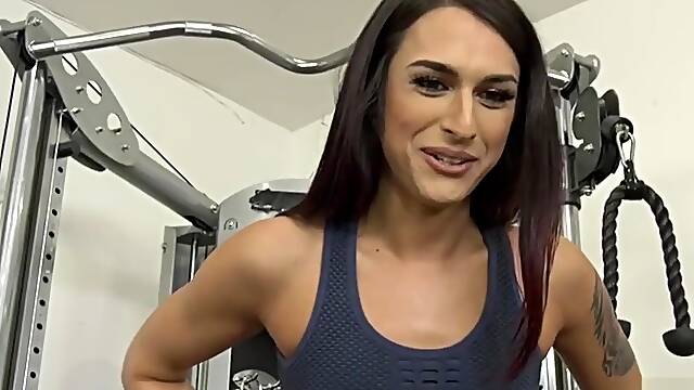 Shemale gym instructor Khloe Kay butt fucked by her client