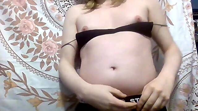 Absolutely super-cute round trans chick de-robe taunt dance in flowery t-shirt