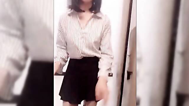 Exhibicionist Asian Ladyboy selfie stick videos flashing her cock on the street