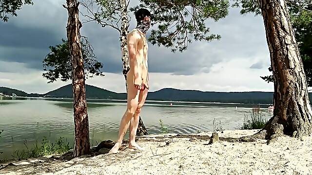 Teen boy on NUDIST BEACH