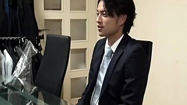 Suit japanese guy with cameraman