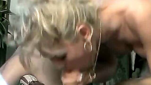 Classic blonde shemale in black stockings poked