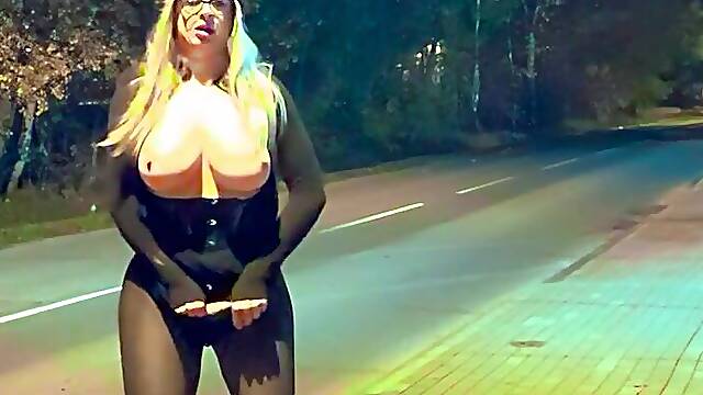 A transvestite strips and masturbates in public