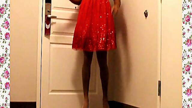 A 1950's SISSY DANCE FOR HER SPOUSE WEARING A PARTY SUIT