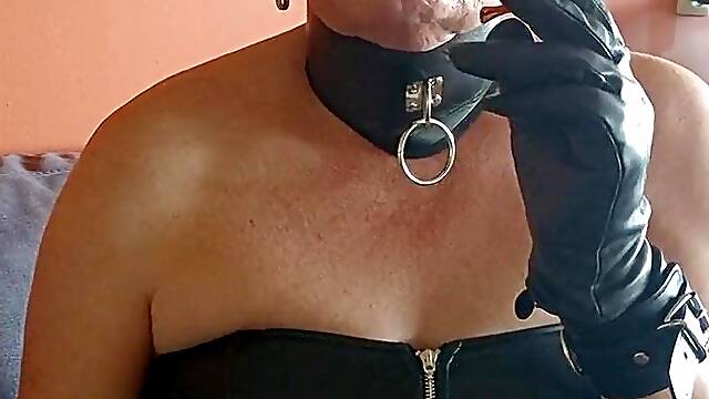 Smokin' with a holder and leather gloves