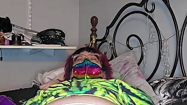 Relaxing in daybed, holding pee, and letting go in a diaper
