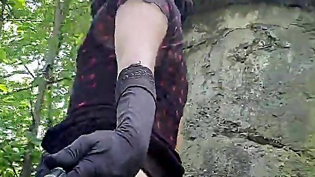 Youthful sissy crossdresser in the park