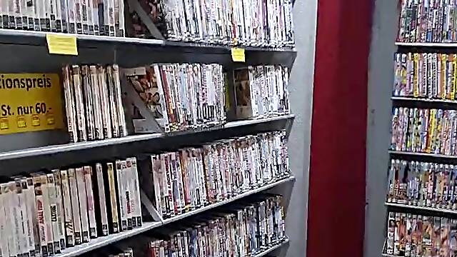 Transsexual Carina bare in the porn shop