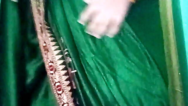 Indian Gay Crossdresser Gaurisissy in Green Saree Pressing Her Big Boobs and Fingering in Her Ass