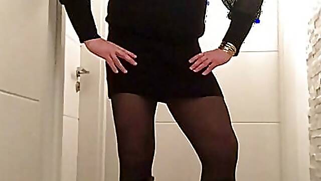 Nicki-Crossdress in a sexy black Mini-Dress, Tights &amp; Boots
