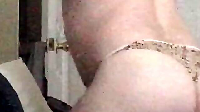 Sissy crossdresser in heels and a thong moaning and grinding while waiting for her date