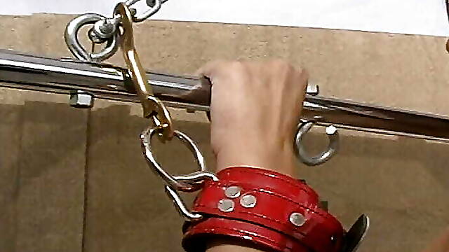 Pretty chick gets tied up and suspended in the air