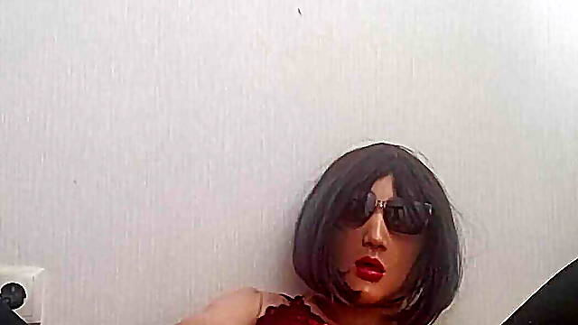 Sissy in stocking plays with toy