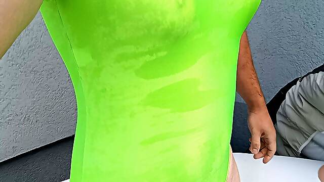 Femboy in hot shiny green one piece swimsuit