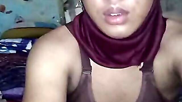 Sexy hijab femboy wearing bikini and playing cock on the bed