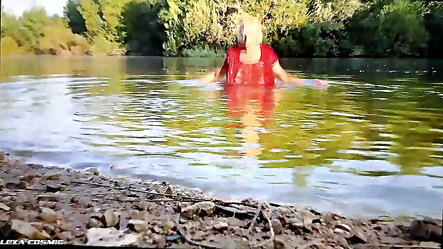 Swimming in the lake in violet skirt and red t-shirt wetlook