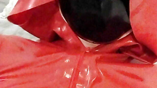 Red latex hooded swing dress and transparent pants cum