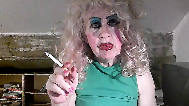 Skanky mature, tgurl fag, smoking sissy slut Sarah in cum stained pink mini skirt and stockings