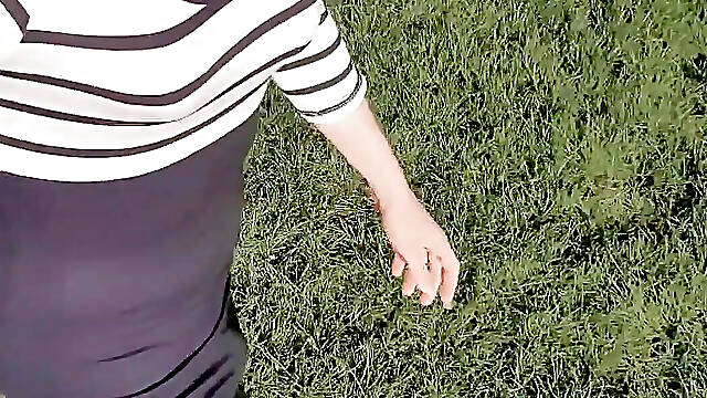 Risky outdoor piss on picknick bench