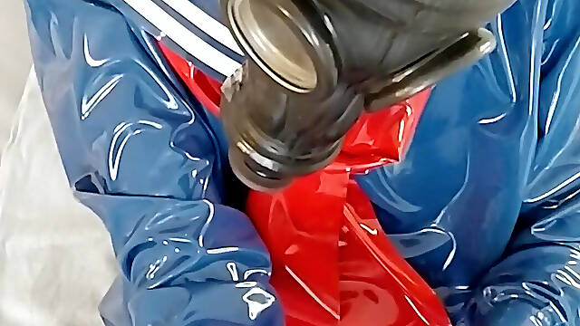 Breathplay masturbation in blue latex Japanese sailor uniform skirt and shirt, rubber maid stockings. Gasmask rebreathing