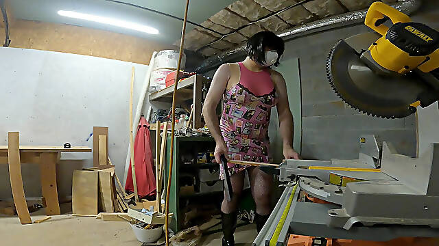Giant fake tits crossdresser working in the wood shop