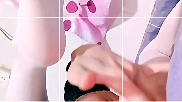 A crossdresser in white stockings uses her fingers to explore her fair, tender anus