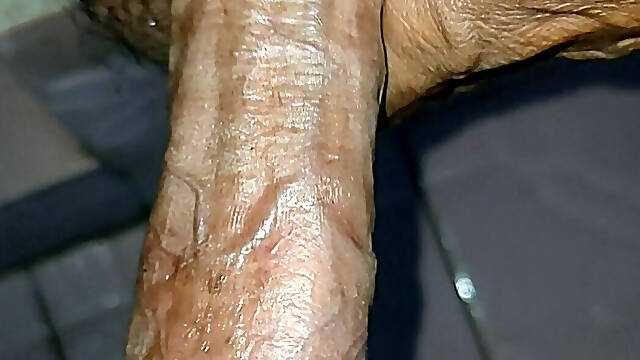 Semen coming out of a long cock